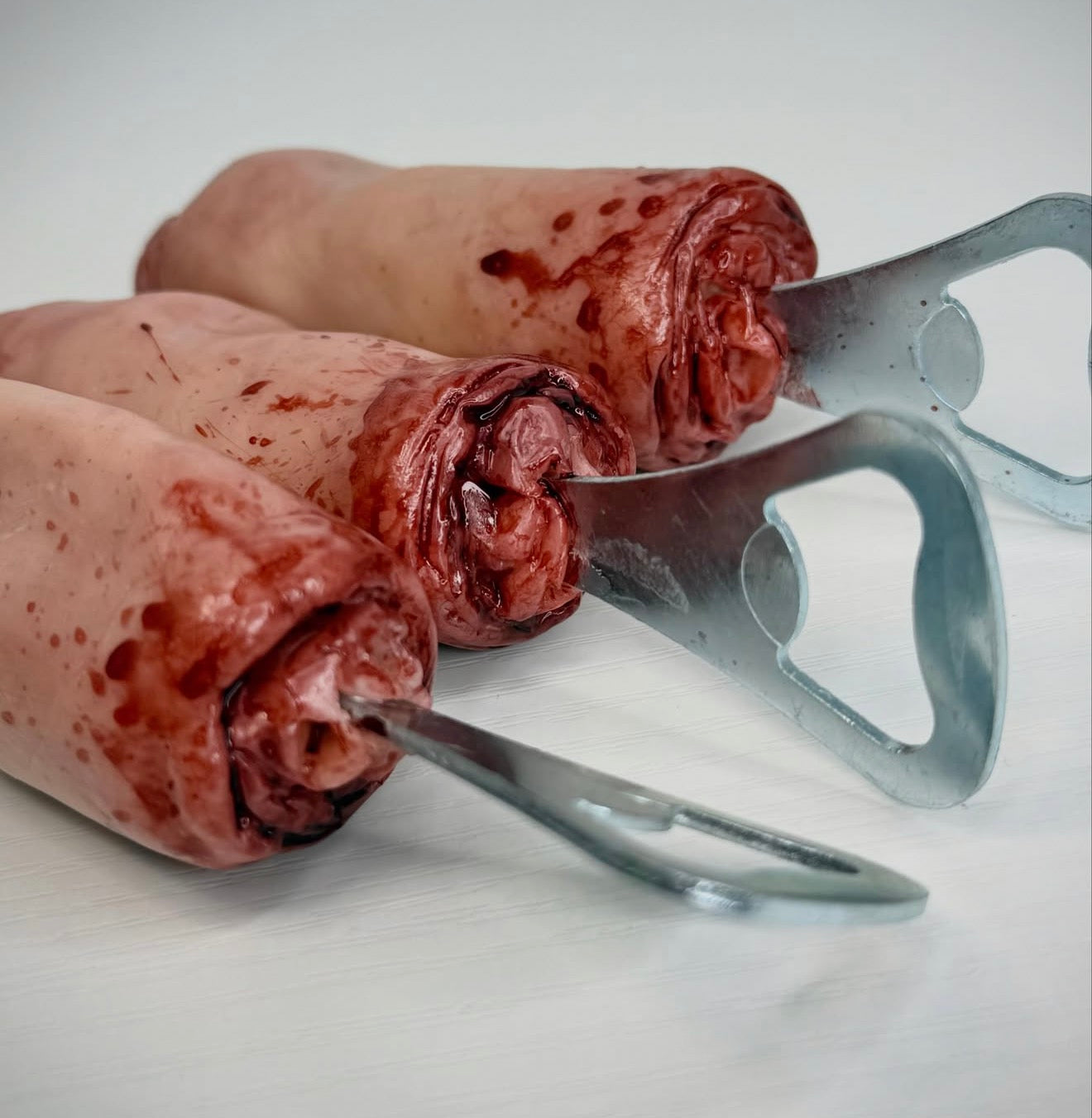 Severed penis bottle opener